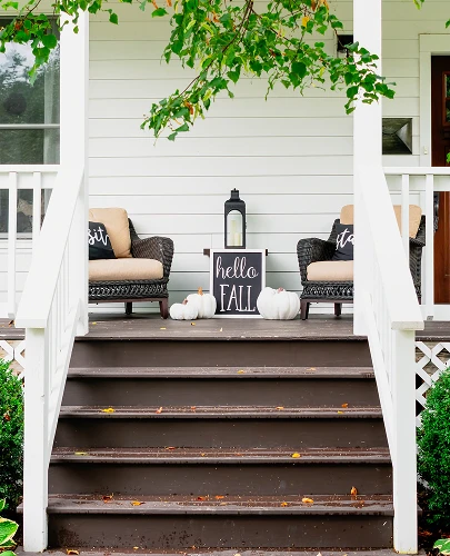 fall-porch-decor-with-pumpkins-and-a-sign-2026-03-16-01-24-03-utc 1